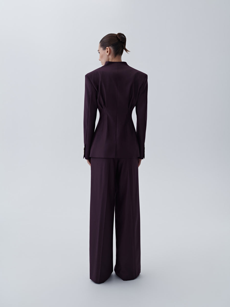 Loose-cut trousers with pleats