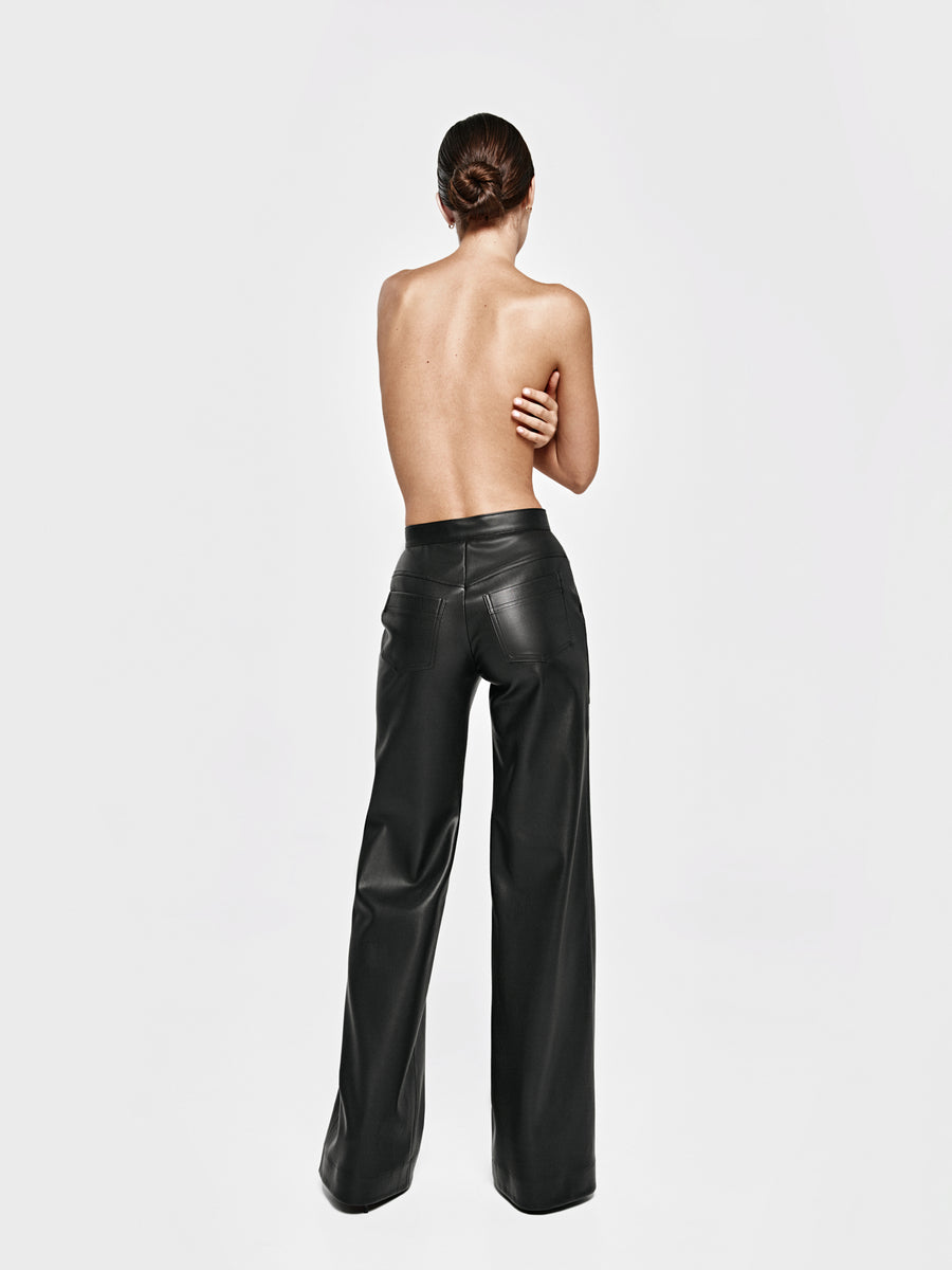 Black mid rise straight pants made of vegan leather with metal zipper