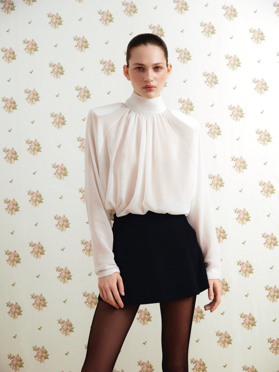 Blouse with padded shoulders
